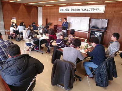 Participants listening to the explanation of a staff of Crisis Management Dept. of Miyako City