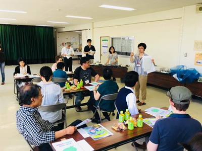 Participants learning how to sort garbage