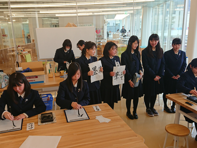 Members of the calligraphy club of Miyako High School